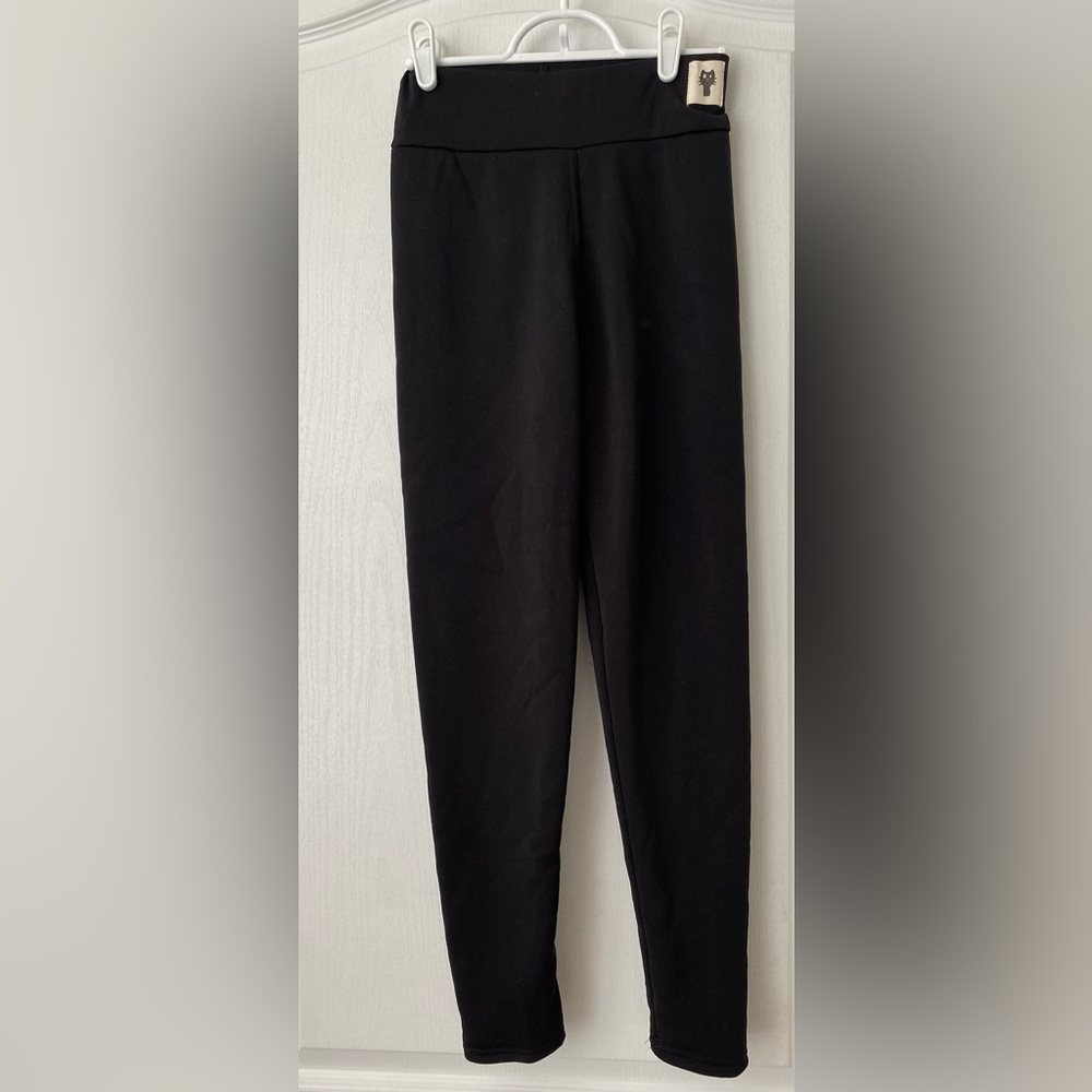 Black leggings. Fuzzy and warm lining. Never been worn! Black cat label